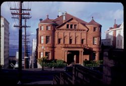 View north on Laguna St. toward classic brownstone on Jackson St.  San Francisco. Wm. Frank Whittier Mansion built in 1896.