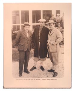 Roy W. Howard and two men