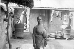 Village woman in courtyard