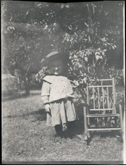 Toddler with chair