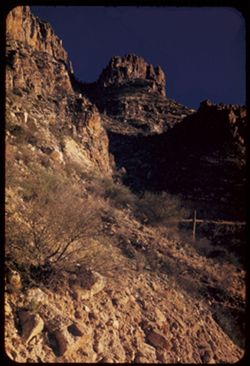 High square rock castle through a gap above Sabino canyon Sta. Catalina Mtns.