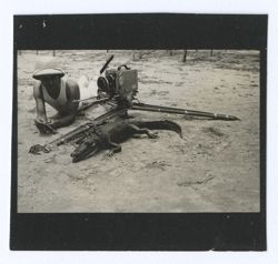 Item 1181. - 1183. Tissé, Alexandrov and Eisenstein on beach with small alligator and camera. See also Items 514-522 above.