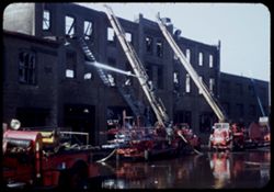 Final stage of fire at Kogen plant at 9246 Harbor St. bet 2 & 3 pm, Firemen and equipment in final stage of fire that gutted factory bldg. At 9246 Harbor - South Chicago - Feb.11 = 2 - 3 pm
