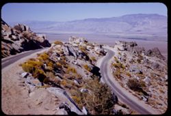 From Mt. Whitney road view is NE across Owens Valley toward distant Inyo Mtns. California.