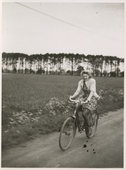Girl cycling on the road