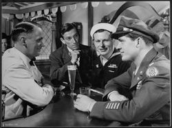 Hoagy Carmichael with Dana Andrews (far right) in a scene from the film The Best Years of Our Lives.
