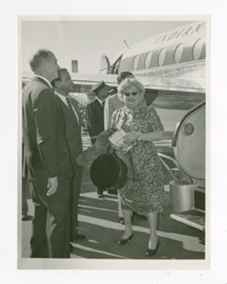 Margaret Howard disembarking a plane