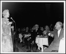 Constance Moore speaking to Hoagy Carmichael at an Indiana University Alumni Association event honoring Carmichael, Hollywood.