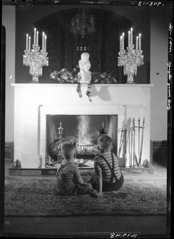 Sconce children at fireplace