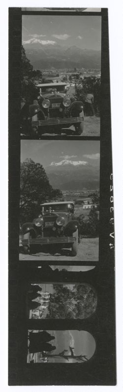 Item 0255. Three strips of contact prints with scenes of various women seen in silhouette in archways, with mountains visible in the far distance. Three prints on a strip.