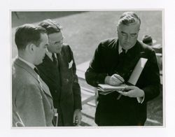 Prime Minister Menzies signing autographs
