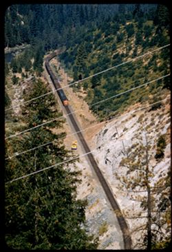 Western Pacific R.R. freight train east bound in Canyon of Mid-Fk. Feather river near Cromberg
