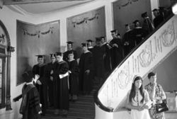 IU South Bend graduates on Morris lobby stairway, 1973