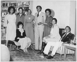 Unidentified group inside Mary Perry Smith's house during an event for BFHFI volunteers