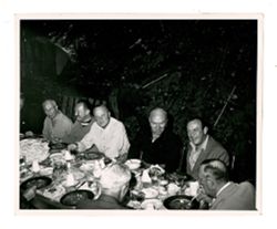 Jack Howard and others drinking and dining at Bohemian Grove