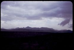 Whitlock Mtns. Under heavy clouds seen from US 70 between Duncan and Safford Arizona