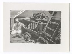 Item 1133. - 1141. Various shots of Eisenstein seated in different locations on deck of ship.