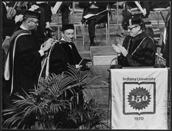 Hoagy Carmichael with Dean Merritt (left) and President John Ryan (right) receiving an honorary Doctorate of Music Degree from Indiana University.