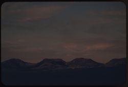 Mtns. s.e. of Alpine seen from south in light of setting sun