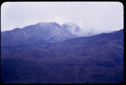 White Mountain Peak under heavy clouds from US 6 n.e. of Bishop
