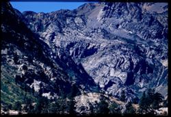 Granite mass below Tioga Peak from east at mid-day Cushman
