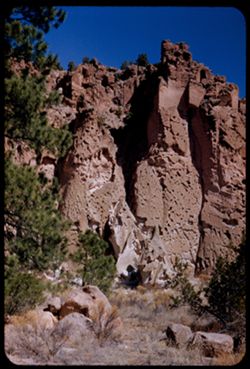 Pocked cliffs in canyon near Bandelier Nat'l Monument. New Mexico.