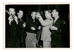 Men laughing and enjoying drinks