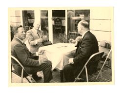 Three men playing cards