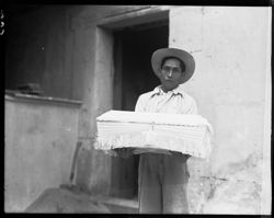 Man with coffin, Oaxaca, horiz