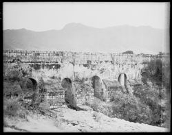 Aqueduct arches, mountains in background, Oaxaca