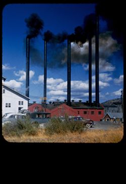 Belching stacks of Long-Bell Lumber Co. mill at Weed, California.