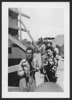 Hoagy Carmichael and an unidentified woman with snakes around their necks.