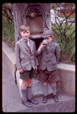 Along Bishopsgate- E.C.2. at St. Botolph church- two boys