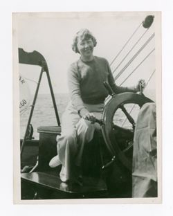 Peggy Hawkins steering boat