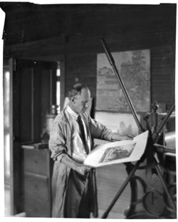 L.O. Griffith at his etching press