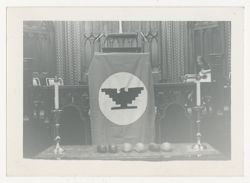United Farm Worker emblem draped over podium
