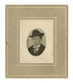 Young Roy Howard with suit and hat