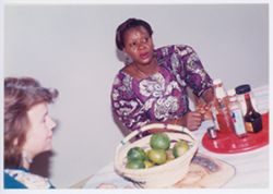 Unidentified woman at a table