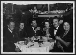 Souvenir photo of Hoagy Carmichael, Ruth Carmichael and four unidentified people at Marcel Lamaze in Hollywood, California.