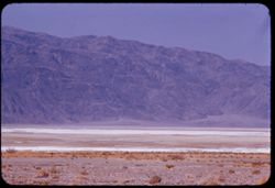 Across Valley floor toward Panamint Mtns. from Hwy near Park Headquarters Death Valley