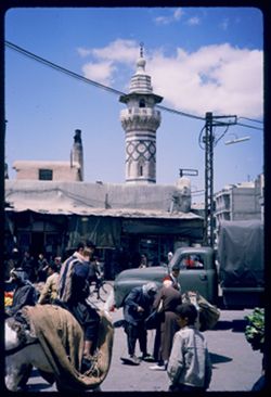 Market scene with minaret Damascus