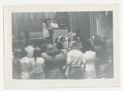 Group standing in church sanctuary