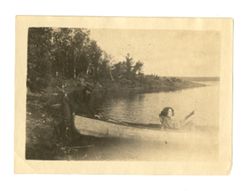 Roy and Margaret Howard with a canoe