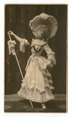Stage actress in ruffled costume