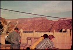 T-11= TOP OF BOULDER DAM FROM OBSERVATION POINT ON NEVADA SIDE. CUSHMAN
