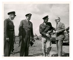 Roy Howard with other men, including Dwight D. Eisenhower