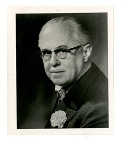 Roy Howard in checkered suit
