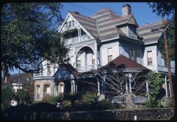 Old gray rambling house at 3900 Saint Charles - near Constantinople. New Orleans.