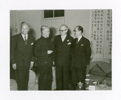 Roy Howard laughing with other at event