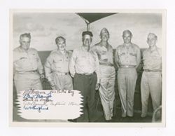 Roy Howard and others atop USS Thetis Bay
